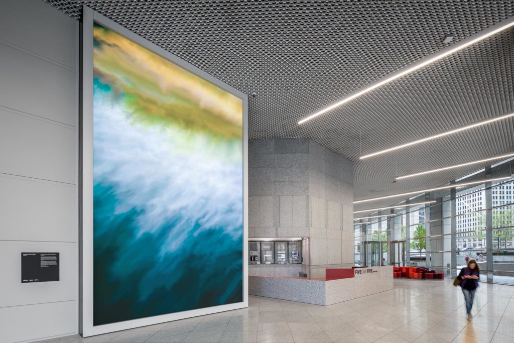 A digital art installation in Chicago uses a software algorithm to "paint". Shown here is an abstracted river scene. 