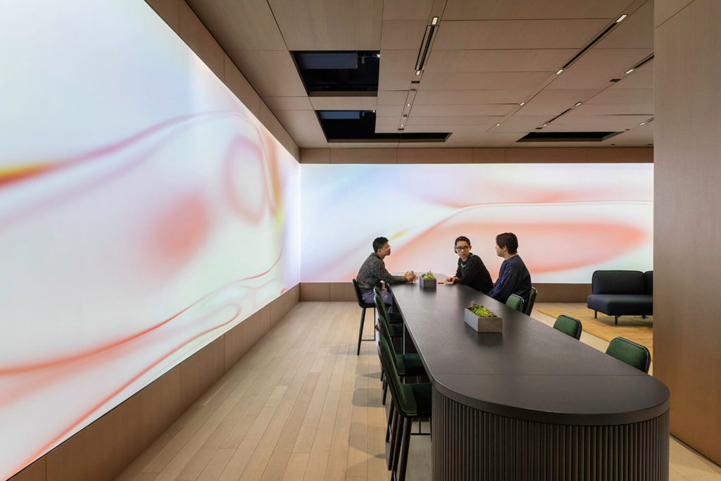 An upstairs meeting space for this financial services company became an immersive environment for corporate communications.