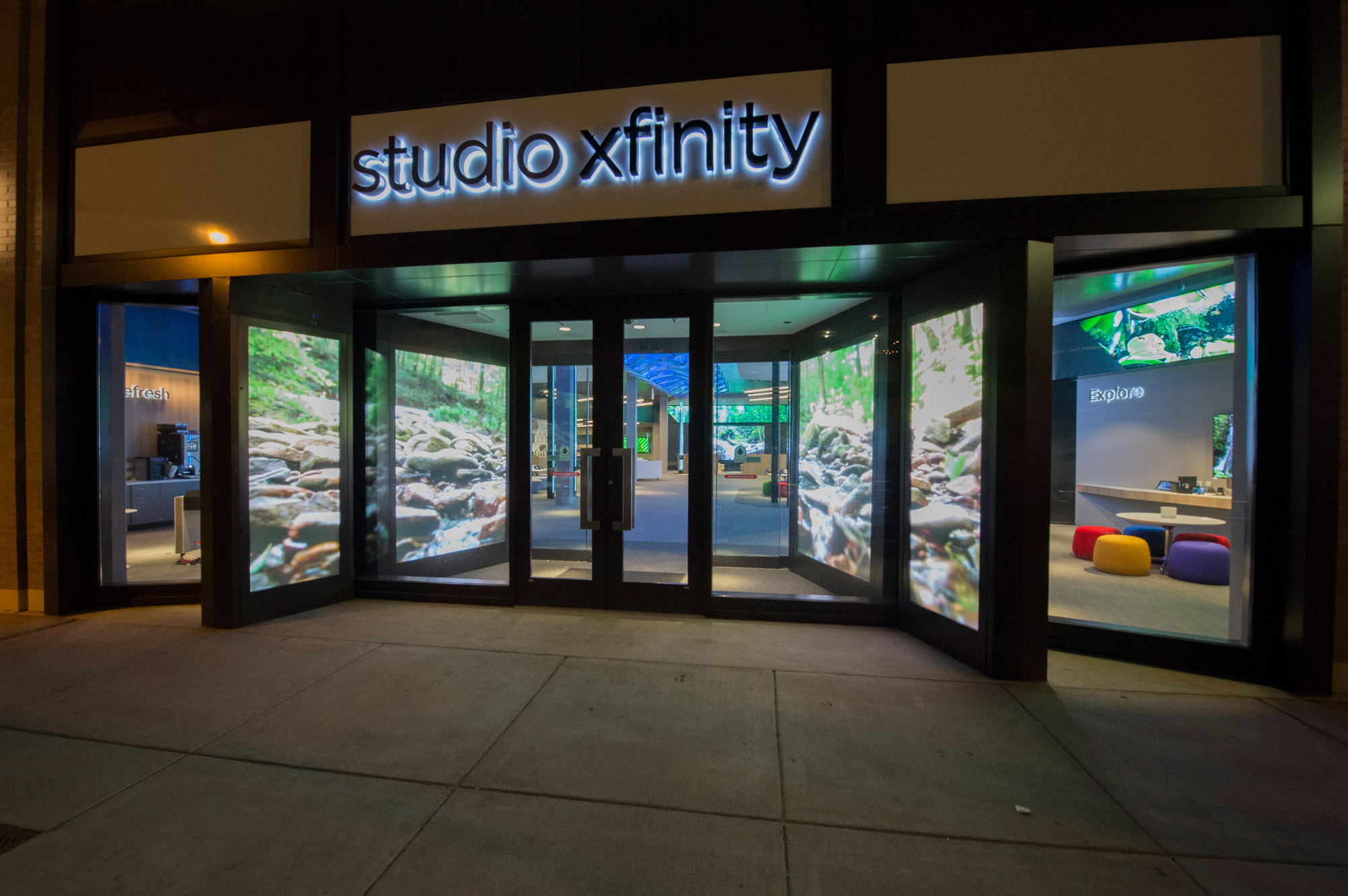 Store exterior with led doorway at comcast studio xfinity store by esi